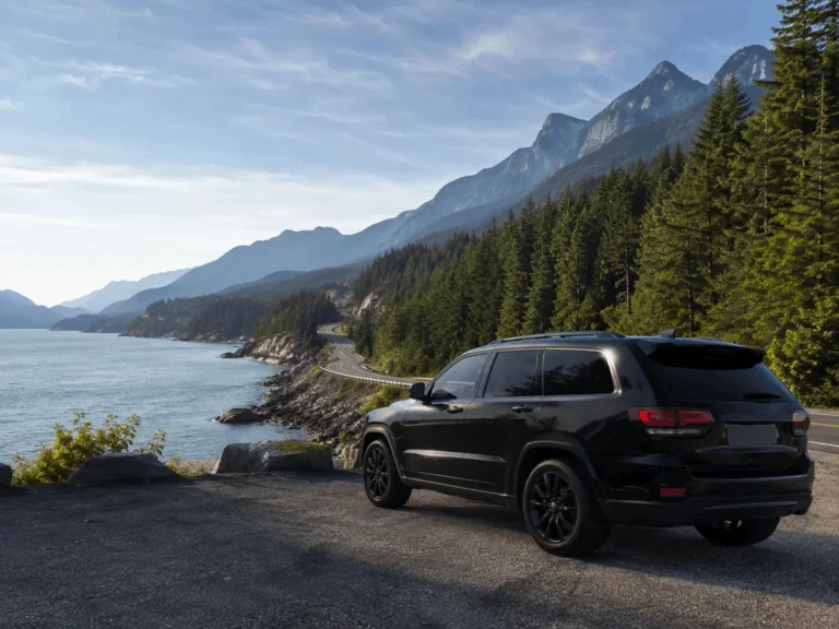 Coastal road with mountain backdrop