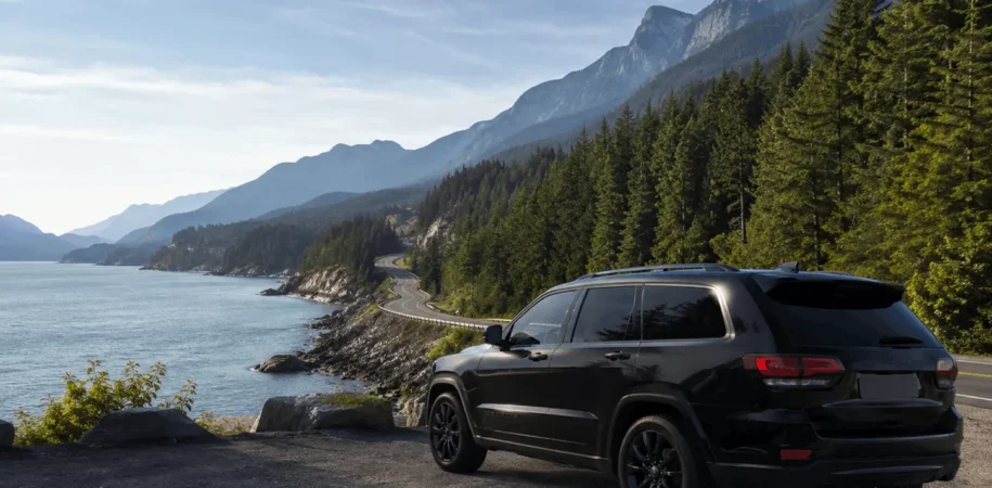 Coastal road with mountain backdrop